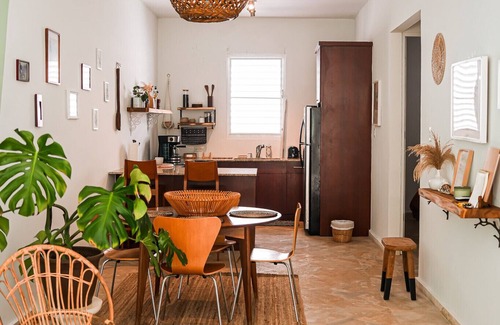 Puerta de Tierra Apartment | Cozy Boho Oasis Steps from the Beach with Family Amenities