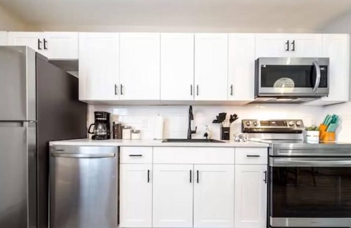 North Central Edmonton House | Boho Suite: Cozy Retreat with King Bed and Fireplace