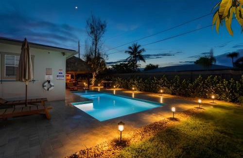 Boynton Beach House | Boho Tiki Villa w Heated Saltwater Pool, King Beds & 6TVs