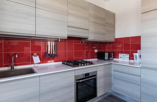 Turro Apartment | Discover Comfort at Boiardo 27 with Family-Friendly Amenities