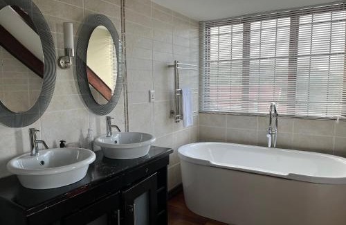Rustenburg Bed & Breakfast | Inviting Bokamoso Views: Oceanfront Bliss with Pool Access