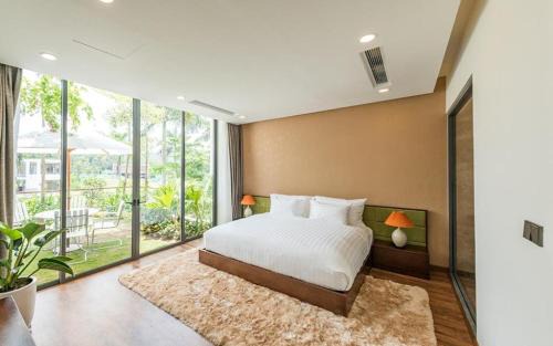 Ngoc Quang Apartment | Discover BOM HOMES - Flamingo Đại Lải Resort Getaway