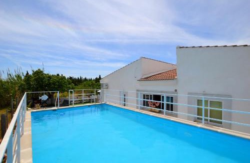 Buger House | Inviting House with Pool Near the Beach - 4-Star Comfort