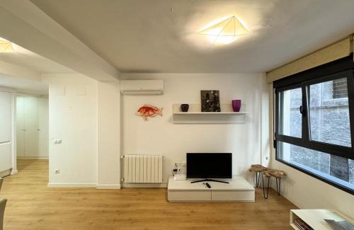 La Xerea Apartment | Elegant Hotel Retreat on Historic Street with Family Amenities