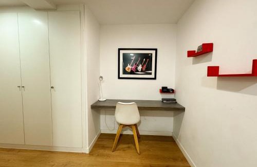 La Xerea Apartment | Elegant Hotel Retreat on Historic Street with Family Amenities
