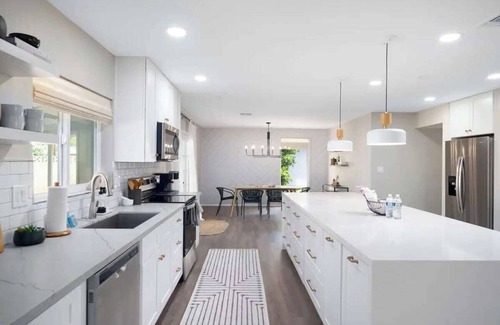 Alhambra House | Inviting Backyard Oasis with Pool and Games for Families