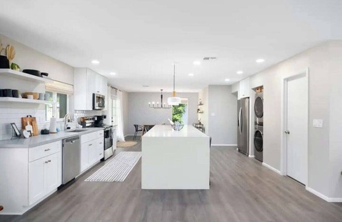Alhambra House | Inviting Backyard Oasis with Pool and Games for Families