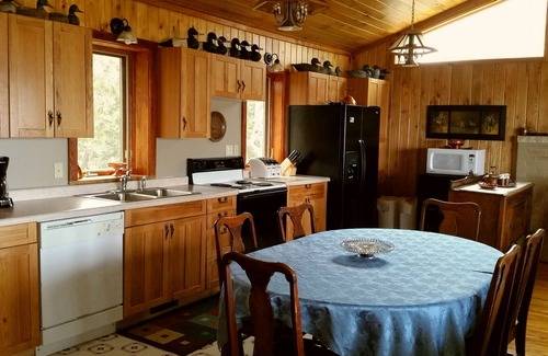 Little Sturgeon House | Relaxing Waterfront Retreat with Private Yard & Fire Pit