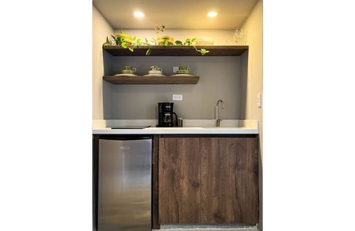 Suramericana Apartment | Book Lover's Haven: A Cozy Retreat with Spa & Breakfast