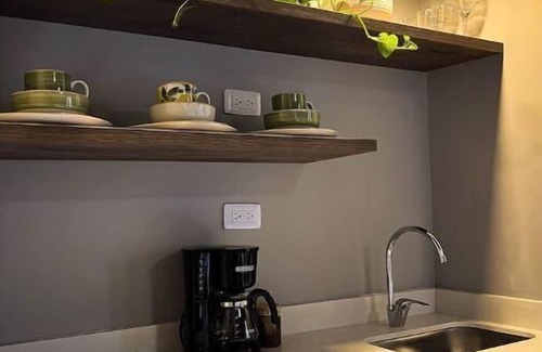 Suramericana Apartment | Book Lover's Haven: A Cozy Retreat with Spa & Breakfast