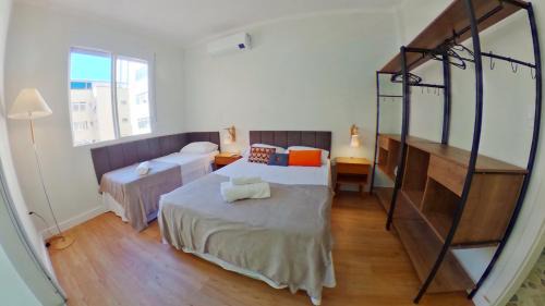 Embare Apartment | Book Santos: Oceanfront Bliss by Embaré Beach, Rated 9.5