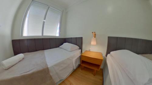 Embare Apartment | Book Santos: Oceanfront Bliss by Embaré Beach, Rated 9.5