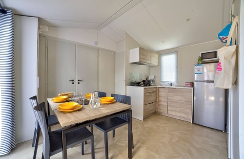 Domino House | Seaside Retreat: Mobile Home with Pool and Ocean View