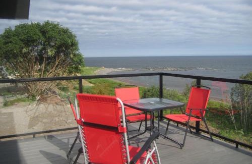 Sainte-Felicite House | Pet-Friendly Oceanfront Retreat with Cathedral Views