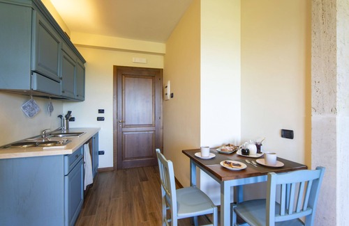 Lucignano House | Discover Borgo Carradori: Spa, Pool & Lake Views Await