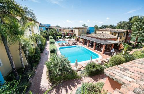 Arbatax Apartment | Discover Borgo Degli Ulivi: Oceanfront Retreat with Pool