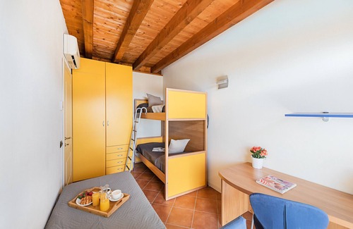 Manerba del Garda Apartment | Inviting Borgo del Torchio G20 Apartment with Pool & Breakfast