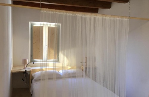 Strongoli Apartment | Discover BORGO PETELIA: Elegant Terrace Retreat for Families
