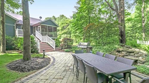 Saugatuck House | Elegant Borrowed Thyme: 4-Star Retreat with Hot Tub