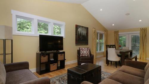 Saugatuck House | Elegant Borrowed Thyme: 4-Star Retreat with Hot Tub