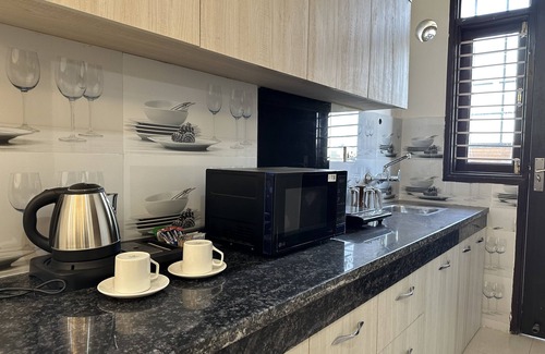 DLF Phase 5 Apartment | Botanical Oasis in the Heart of the City - Plum Tree Hotels