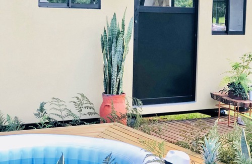 Copacabana House | Botanico Glamping: Ocean View Mobile Home with Spa Amenities