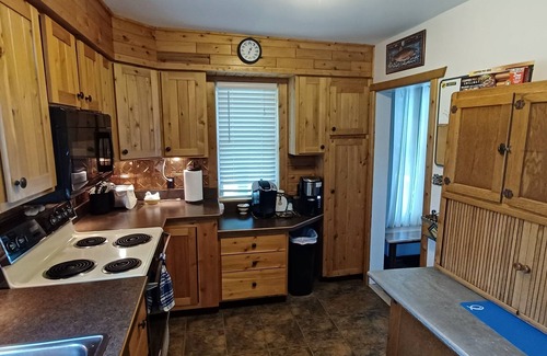 West Branch Cottage | Perfect Retreat: Lake & River Frontage with Great Fishing!