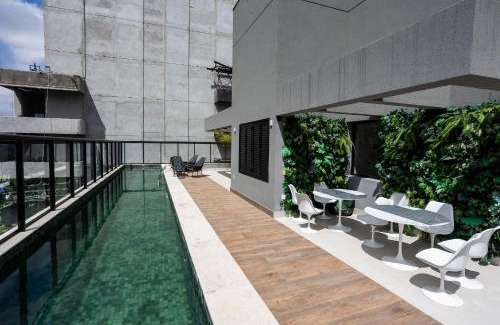 Indianopolis Apartment | Discover Boulevard Ibirapuera: 4-Star Poolside Retreat