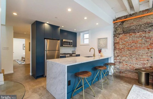Washington Square West Condo | Stylish Bi-Level Penthouse Loft in Washington Sq West