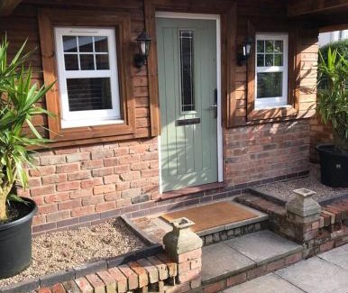 Wolverhampton House | Experience Boutique Garden Lodge @ The Larches - 5 Star Stay