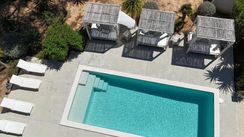 Sant Josep de sa Talaia Apartment | Stylish CASA CARACOL: Oceanfront Adults-Only Retreat