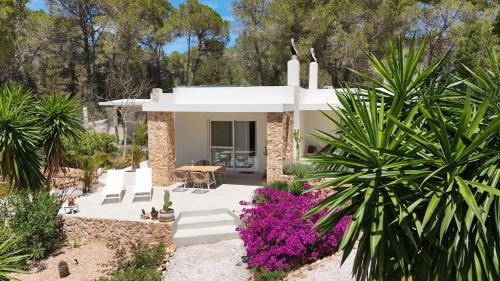 Sant Josep de sa Talaia Apartment | Stylish CASA CARACOL: Oceanfront Adults-Only Retreat