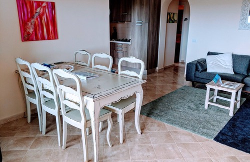 Porto Pozzo Apartment | Seaview Apartment with Private Garden & Pool Retreat
