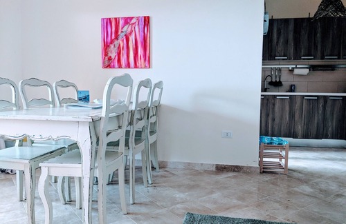 Porto Pozzo Apartment | Seaview Apartment with Private Garden & Pool Retreat