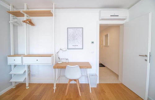 Brigittenau Apartment | Elegant Boutique Sky City Apartment with Balcony View