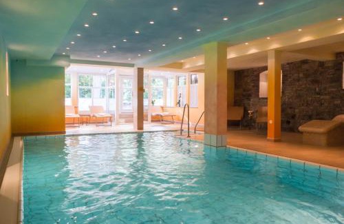 Wernigerode Hotel | Elegant Boutiquehotel Schloßpalais with Pool & Spa Amenities
