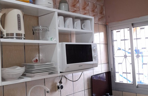 Douala Bed & Breakfast | Discover Bovy Home: Child-Friendly Retreat with Kitchen
