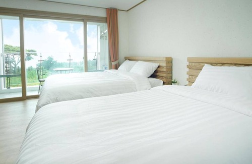 Jungmun House | Discover Bowoohill: Highly Rated Stay with Family-Friendly Perks