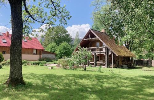 Plavniekkalns House | Cozy Brīvdienu māja Būmaņi: Family-Friendly with Hot Tub