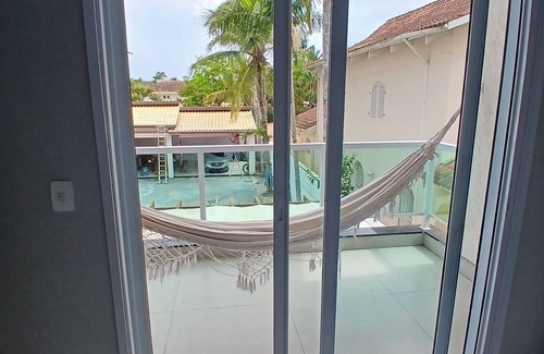 Jardim Virginia House | Cozy house 500m from the beach in Guarujá, pet friendly