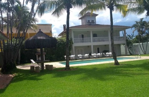 Balneario Praia do Pernambuco House | Casa 4 Suites- Piscina/churrasqueira, Wi-fi, Próximo à Praia de Pernambuco
