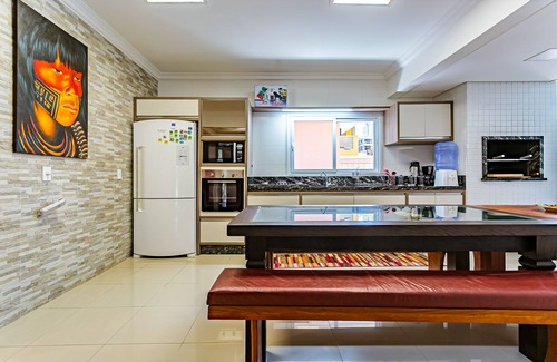 Governador Celso Ramos House | Unforgettable Oceanfront Retreat with Pool and Spa Amenities