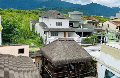 Vargem Grande Apartment | Master suite with balcony. Recess of the pioneers.