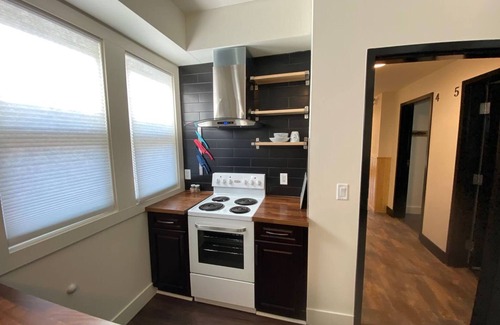 North Central Edmonton Apartment | Modern 1 Br Apartment Near Attractions with Breakfast Included