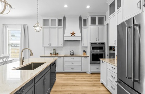 Thomas Drive House | BRAND NEW-Luxurious 5 BR house w/HEATED POOL, fenced yard, Pet Friendly, PCB