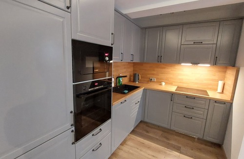 Poznan Apartment | New Apartment with Private Patio & Top Amenities Await You