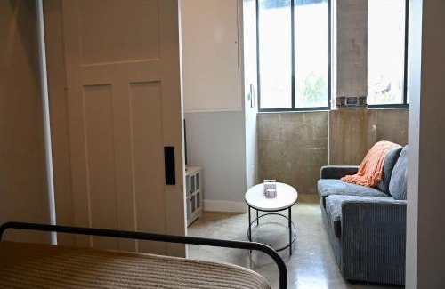 Historic Southwest Apartment | Modern Urban Loft with Free Parking Near Mayo Clinic