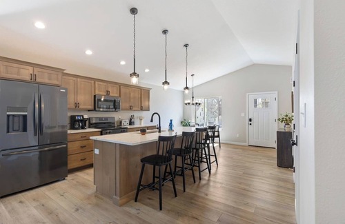 Cedar Falls Apartment | Brand New/walk to Downtown w/Hot tub & fenced yard