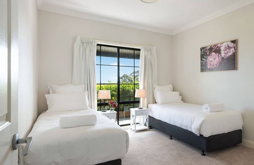 Back Forest House | Branga Park: Timeless Colonial Elegance with Ocean Views