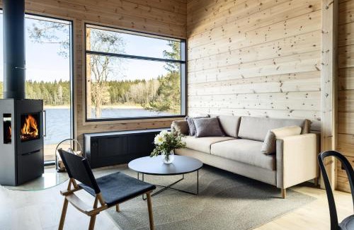 Kouvola Resort | Discover Tykkimäki Resort: Oceanfront Getaway with Hot Tub